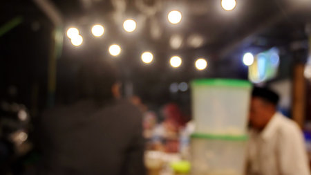 Blurred bokeh of the dining tables and chairs in vintage style image.の写真素材