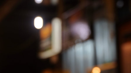 Blurred bokeh of the dining tables and chairs in vintage style image.の写真素材