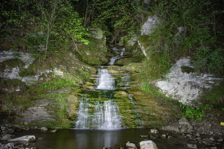 Waterfall in the Ukrainian Carpathians at nightの写真素材