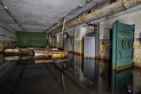 Abandoned and flooded Soviet bomb shelterの写真素材