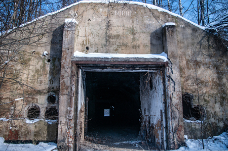 Entrance to an abandoned Soviet bunkerの写真素材