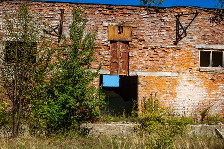 Brick wall of an abandoned factory shopの写真素材