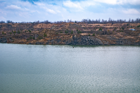 Poisonous lake in an old quarryの写真素材