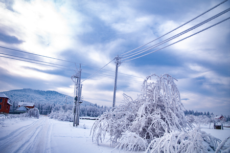 Thick frost on electric wiresの写真素材