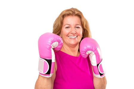 Happy female boxer with her pink glovesの写真素材