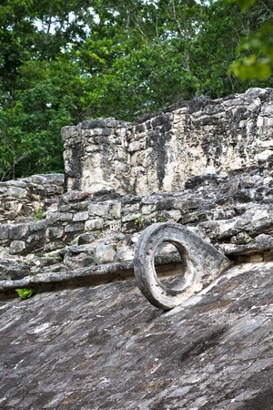 Deadly game, Mayan Ball game at ballcourt, ancient stone goal attached to the pyramid structure.の写真素材