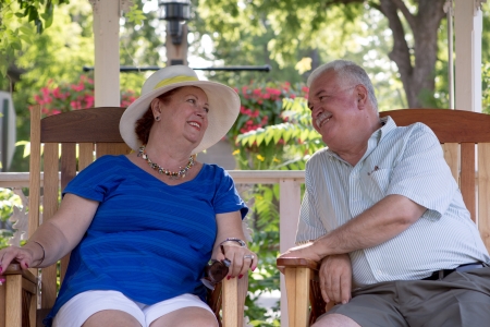 Senior couple looking at each other with trust and loveの写真素材