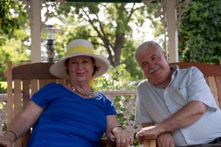 Senior couple looking at camera with trustの写真素材