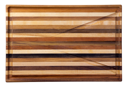Multicolor wooden cutting board with grooves for water collectionの写真素材