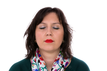 Young business woman with closed eyes relaxing perhaps she has a migraine, Isolated on white backgroundの写真素材