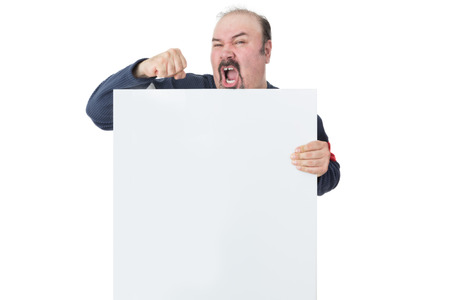 Mature man holding a blank white billboard and protestingの写真素材