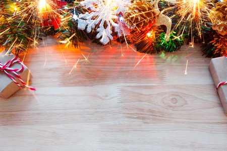 Christmas background with copy space for product montage or text message. xmas tree on wood table.の写真素材
