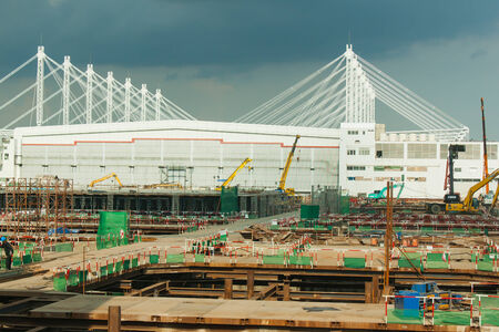 Construction a building in urban by man and machineのeditorial素材