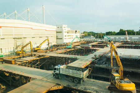 Construction a building in urban by man and machineのeditorial素材
