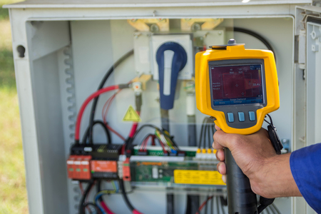 Thermoscan(thermal image camera), Scan to the breaker for temp check.の写真素材