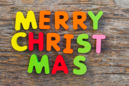 The wooden letter came in the word Merry Christmas.の写真素材