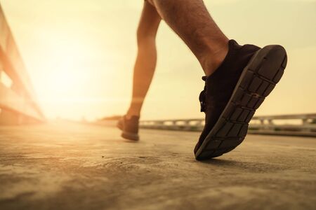 The man jogging in the evening for good health.