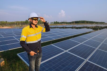 Young engineers who are expert in solar power generation systems, alternative electricity source, concept of sustainable resources.の写真素材