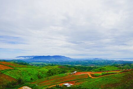 Fresh green mountainand and cloudy sky in morning, at Khao Kho, Phetchabun, Thailand.の写真素材