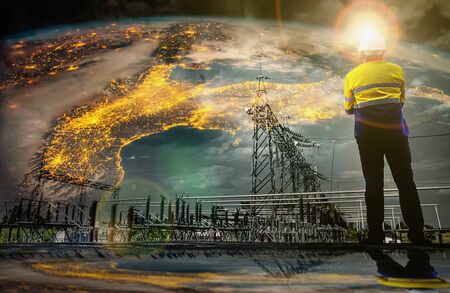 Engineers look at the High voltage switchyard that generates electricity for the people on earth,...