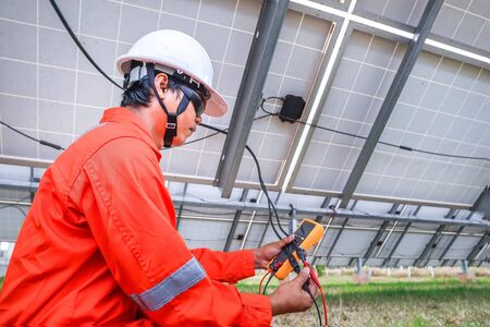 Engineers used a tool for checking the performance of the solar panel to confirming systems working...