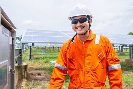 Engineers are checking the operation of the control panel, solar panel adjustment system according...