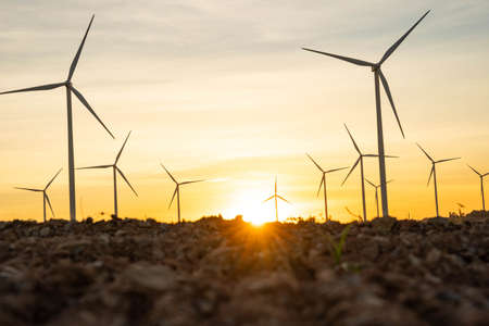 Wind turbines are alternative electricity sources, the concept of sustainable resources, Beautiful sky with wind generators turbines, Renewable energy.の写真素材