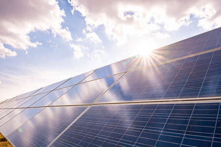 Solar plant(solar cell) with the summer season, hot climate causes increased power production, Alternative energy to conserve the world's energy, Photovoltaic module idea for clean energy production.の写真素材