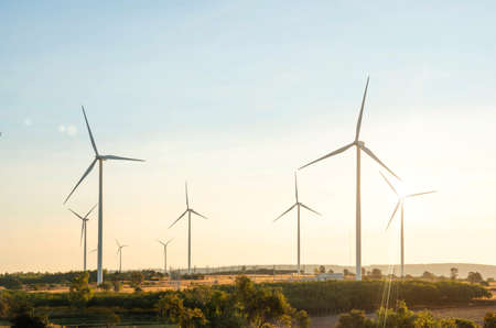 Wind turbines are alternative electricity sources, the concept of sustainable resources, Beautiful sky with wind generators turbines, Renewable energy.の写真素材