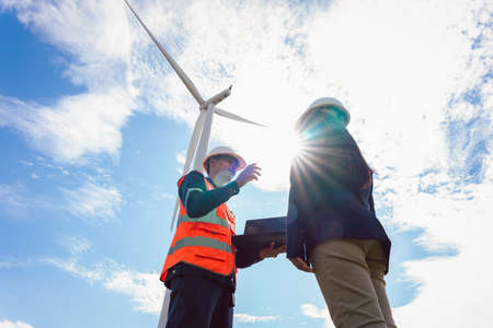 Engineers take investors on a tour of wind power plants. Wind turbines are an alternative...