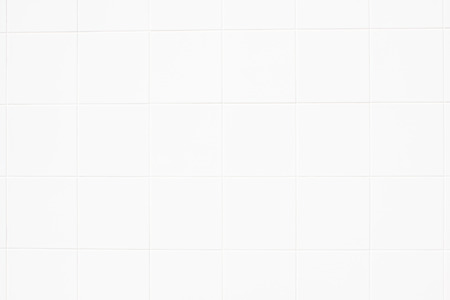 White ceramic floor tiles for the decoration of the bedroom.