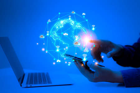 information technology networks Internet connecting wireless devices around the world. information technology is essential to businesses in the digital world with  and icons connected to each otherの写真素材