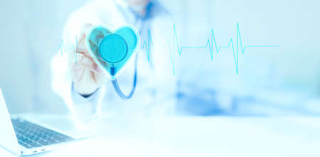Medical Technology diagnosis of cardiac concepts. Doctor and stethoscope of heart touch icon.  Medical Technology analysis the Network connection virtual screen interface. Hospital blur Backgroundの写真素材