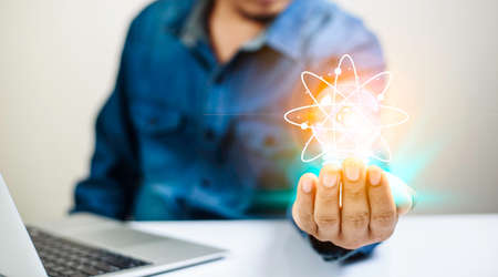 Business People touch Light bulb.Concept of Ideas for Success. Concept with Innovation Invention. Success Starting from a new idea to innovative technology based on data from the Internet, big data.の写真素材