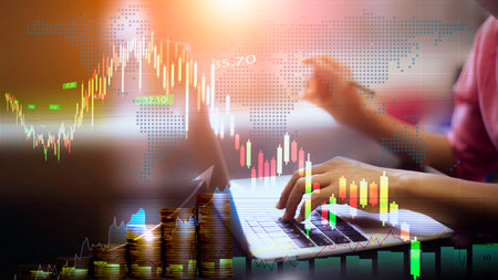 stock market investments chart showing. Businessmen work with stock market investments using...