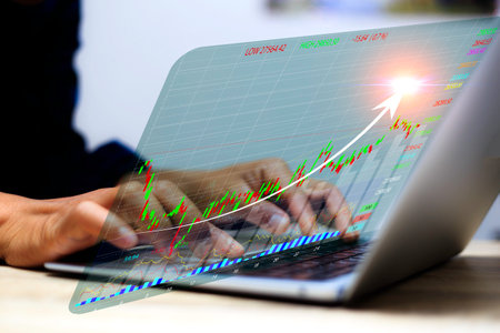 stock market investments chart showing. Businessmen work with stock market investments using...