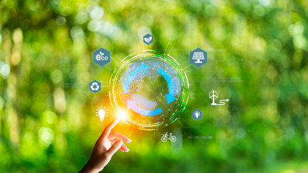 green energy concept help reduce global warming.Hand holding natural background light bulb on green...