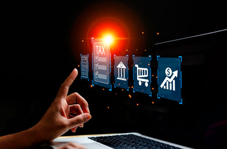 Businessman using laptop to fill in the income tax online return form for payment.business using...
