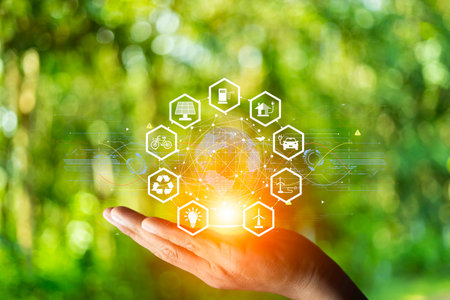 concept eco earth day. green tree growing in a light bulb On the background blurred image of green...