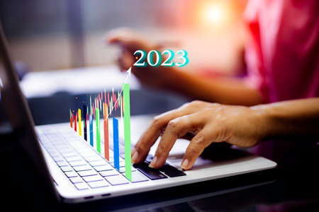 Businessman showing growing virtual hologram stock graph. investment trading planning analyzing...