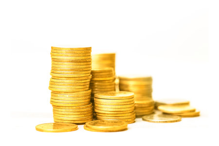 Golden Coins chart on White Background displays increase inflation. financial graph showing inflation. Stock market statistics, crisis, inflation, Money Growth Concept.の写真素材