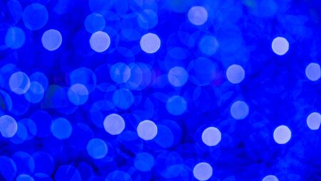 Blue Festive Christmas elegant abstract background with bokeh lights and starsの写真素材
