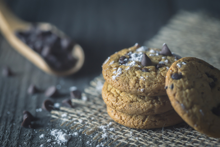 Chocolate chip cookies on wooder background.vintage styleの写真素材