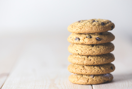Chocolate chip cookies on wooder background.vintage styleの写真素材