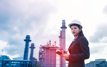 woman engineer and men engineer working new project in power plantの写真素材
