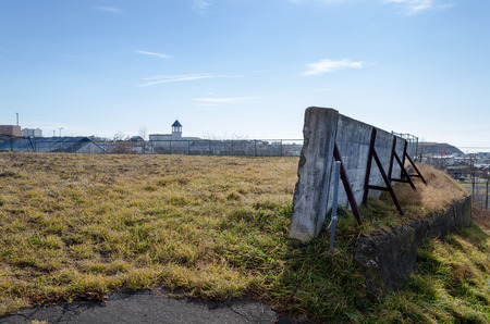 Vacant lot surrounded by old wallsの写真素材