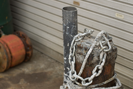 The metal bars and chains
