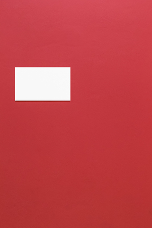 White Blank Poster in red wallの写真素材