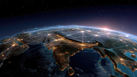 This breathtaking image showcases a view of Earth from space, focusing on Asia at night, with bright city lights and glowing network connections that emphasize global connectivity.の素材