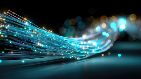 A stunning abstract representation of glowing fiber optics illuminated by colorful lights, creating a captivating visual effect against a dark backdrop.の素材